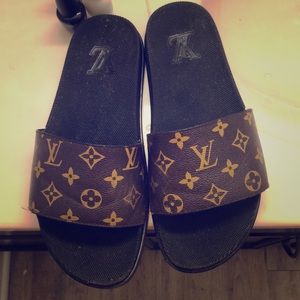Louis Vuitton flip flops. Will clean before sendin